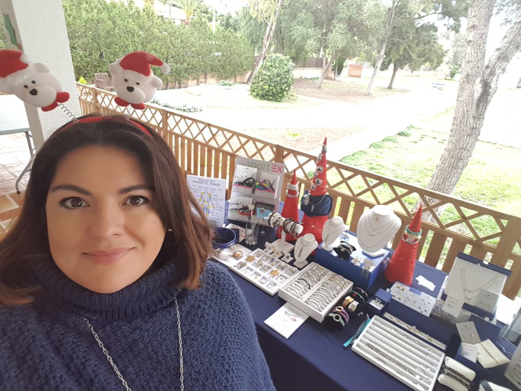 Mads in front a table displaying ENERGETIX magnetic jewellery