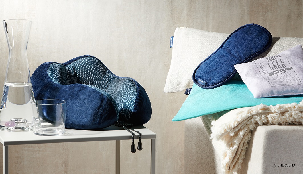 Table with MagnetComfort neck pillow, and chair with MagnetRelax Eye Mask and 100% Feel Good Magnet Cushion with removable inserts. ENERGETIX