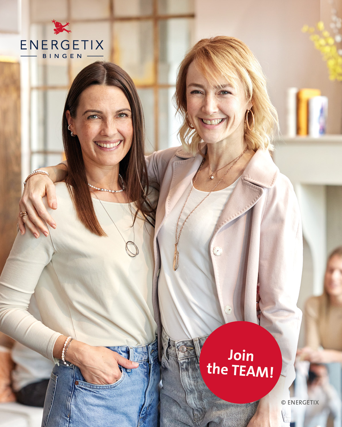 Two ladies with their arms aroudn each other, smiling broadly and wearing ENERGETIX Magnetic Jewellery, with text that says; Join the team!