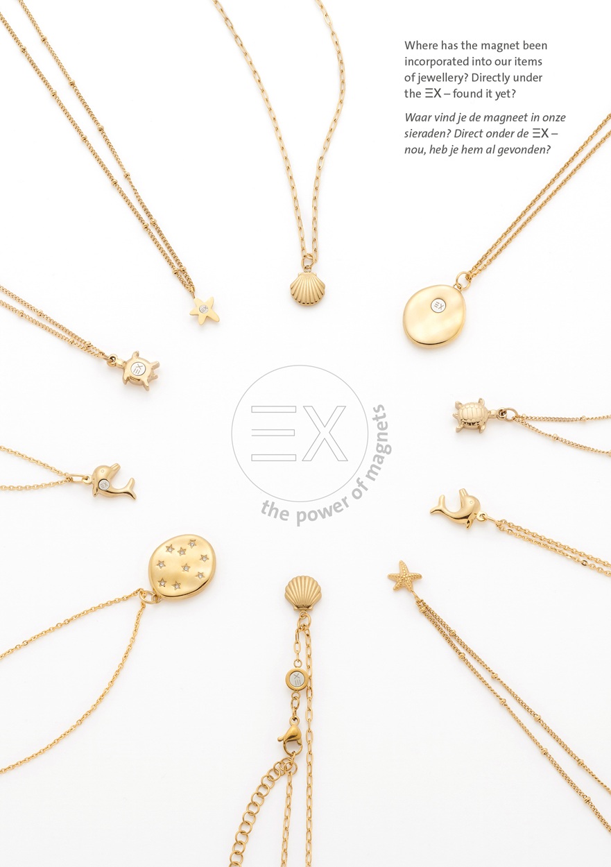 A circle of gold-coloured ENERGETIX magnetic jewellery, all with symbols of the sea - starfish, turtle, dolphin, and seashell